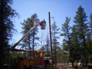 Naturist Legacy History: Gallery 09/23...Hydro installs wires and a transformer